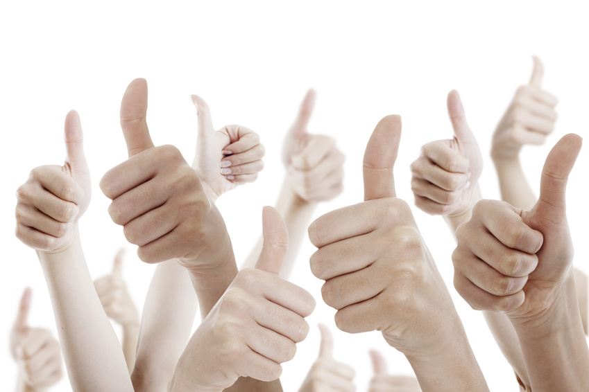 Many people holding their thumbs up on white background